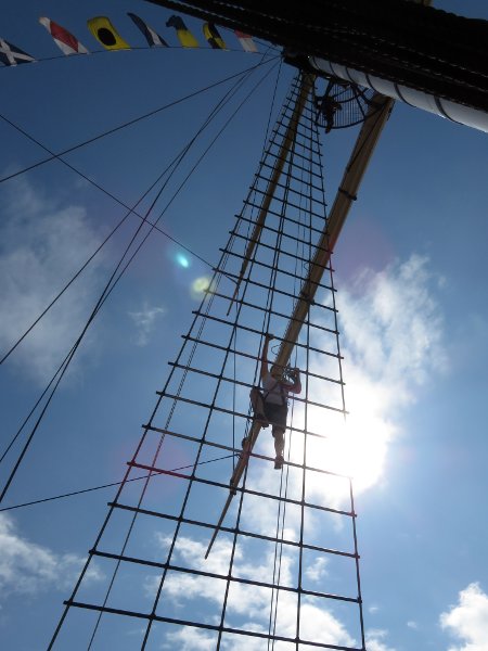 me climbing a boat